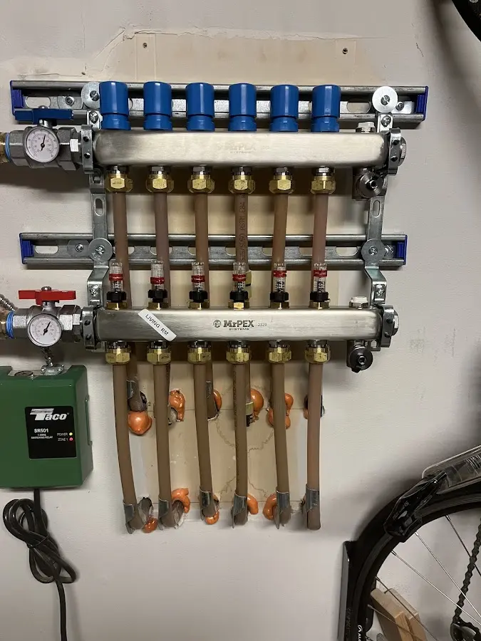 Plumber performing Leak Detection at a residential property in Beachwood